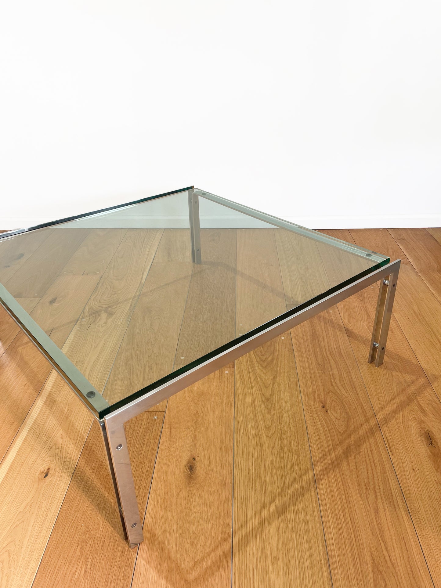 Minimalist modern chrome and glass M1 coffee table by Metaform