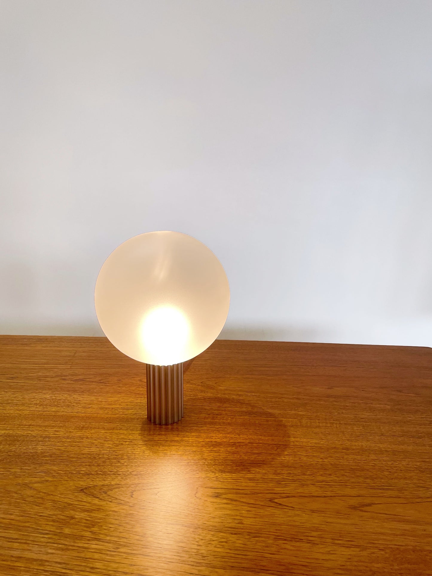 Attelos designer lamp fabricated in Melbourne/Naarm, fluted metal and LED sphere