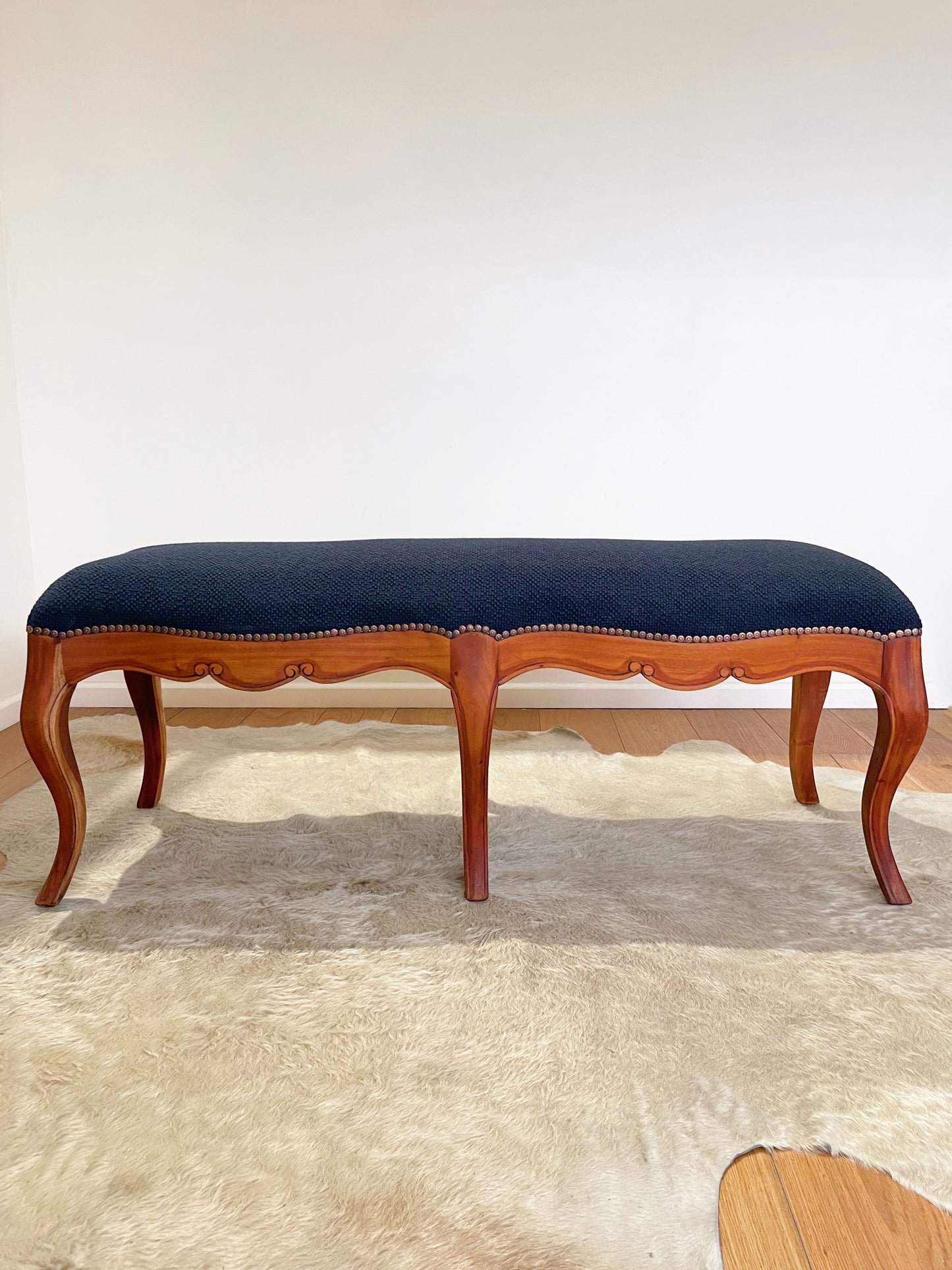 Antique Tasmanian Blackwood hallway bench refurbished in Melbourne with navy wool designer homewares